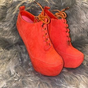 Orange lace up booties